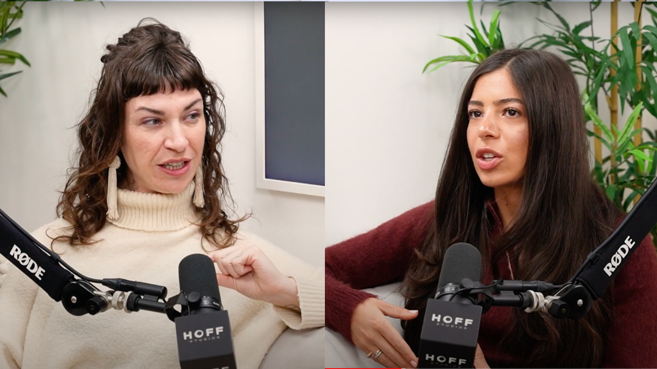 Two women talking in a podcast interview in a studio with HOFF microphone windscreens and Rode microphone arms